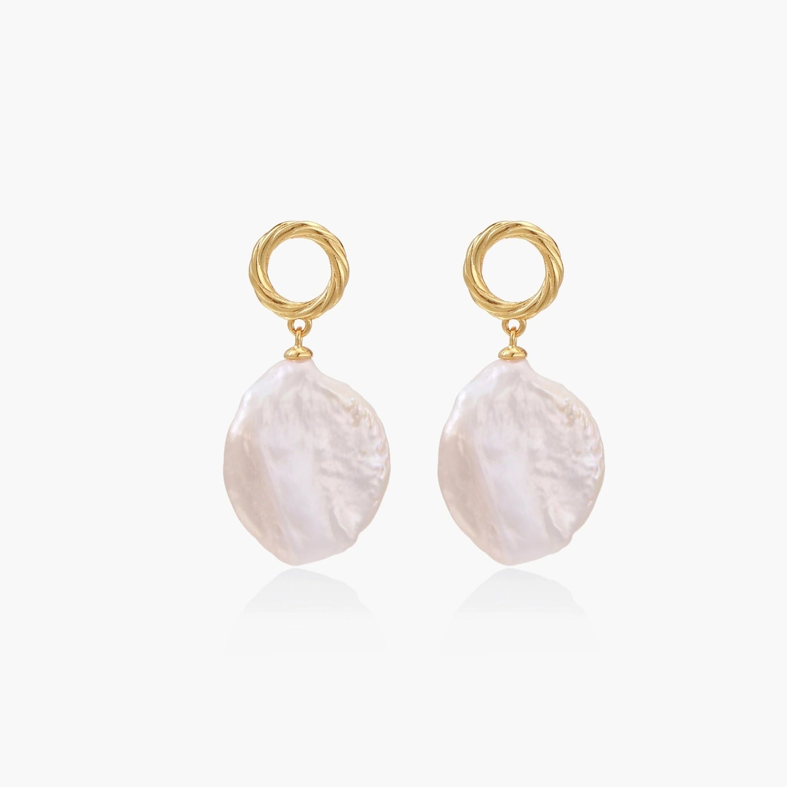 18K gold vermeil twisted circle studs with organic white baroque pearl drops on cream background