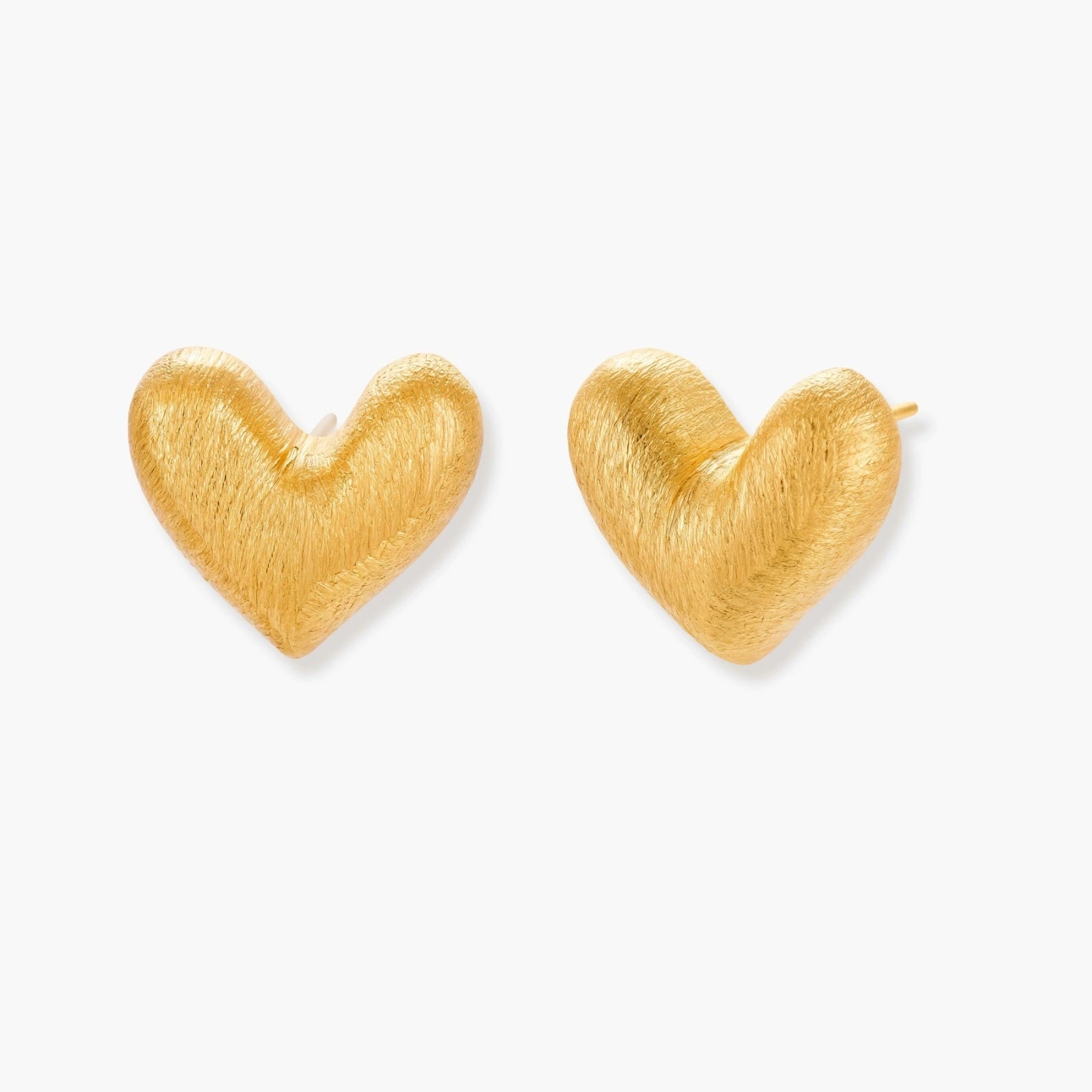 Pair of small heart-shaped stud earrings with brushed metallic finish, showing both silver and gold variants on neutral background.