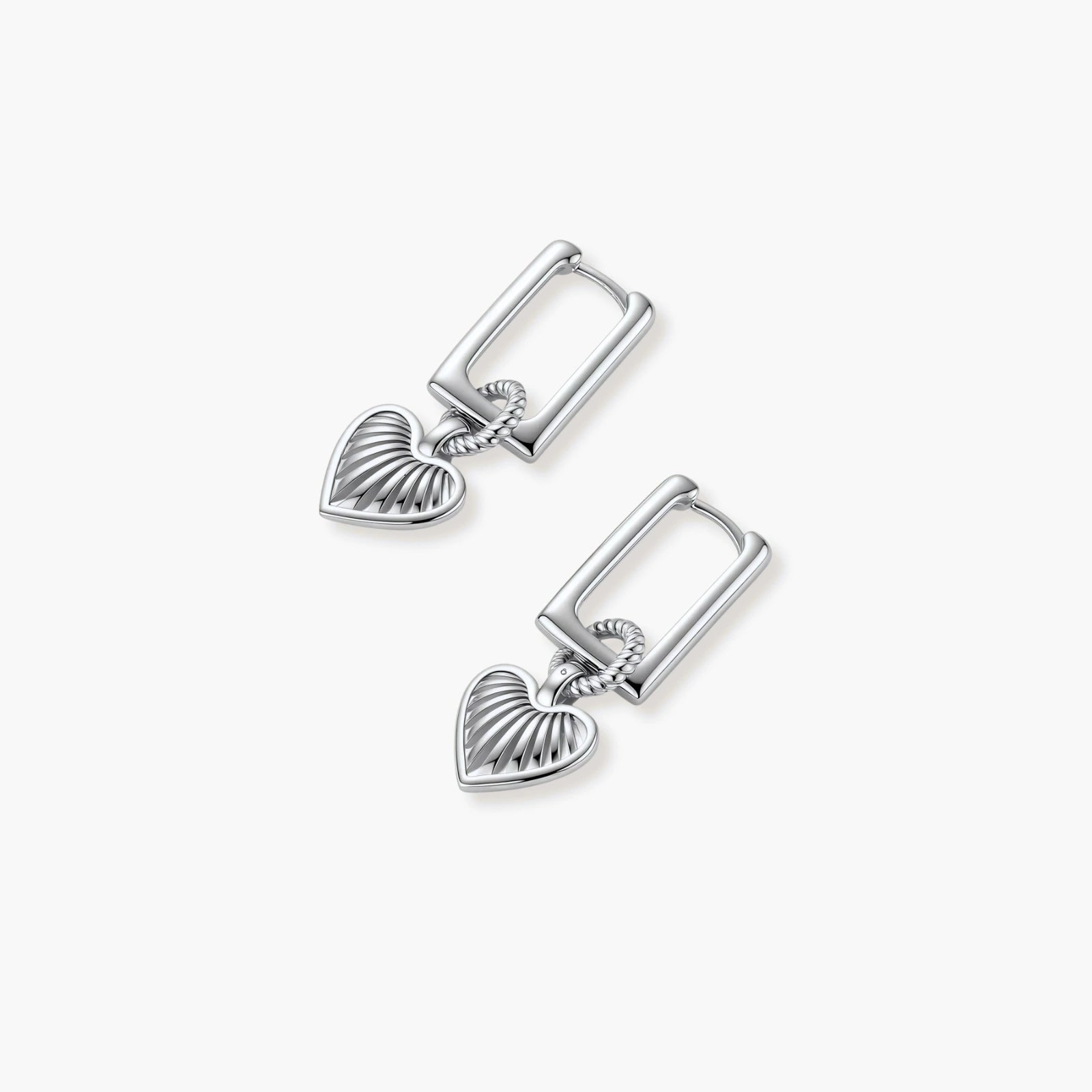 Platinum-plated 925 sterling silver rectangular hoop earrings with twisted ring connector and ribbed heart charm pendant.