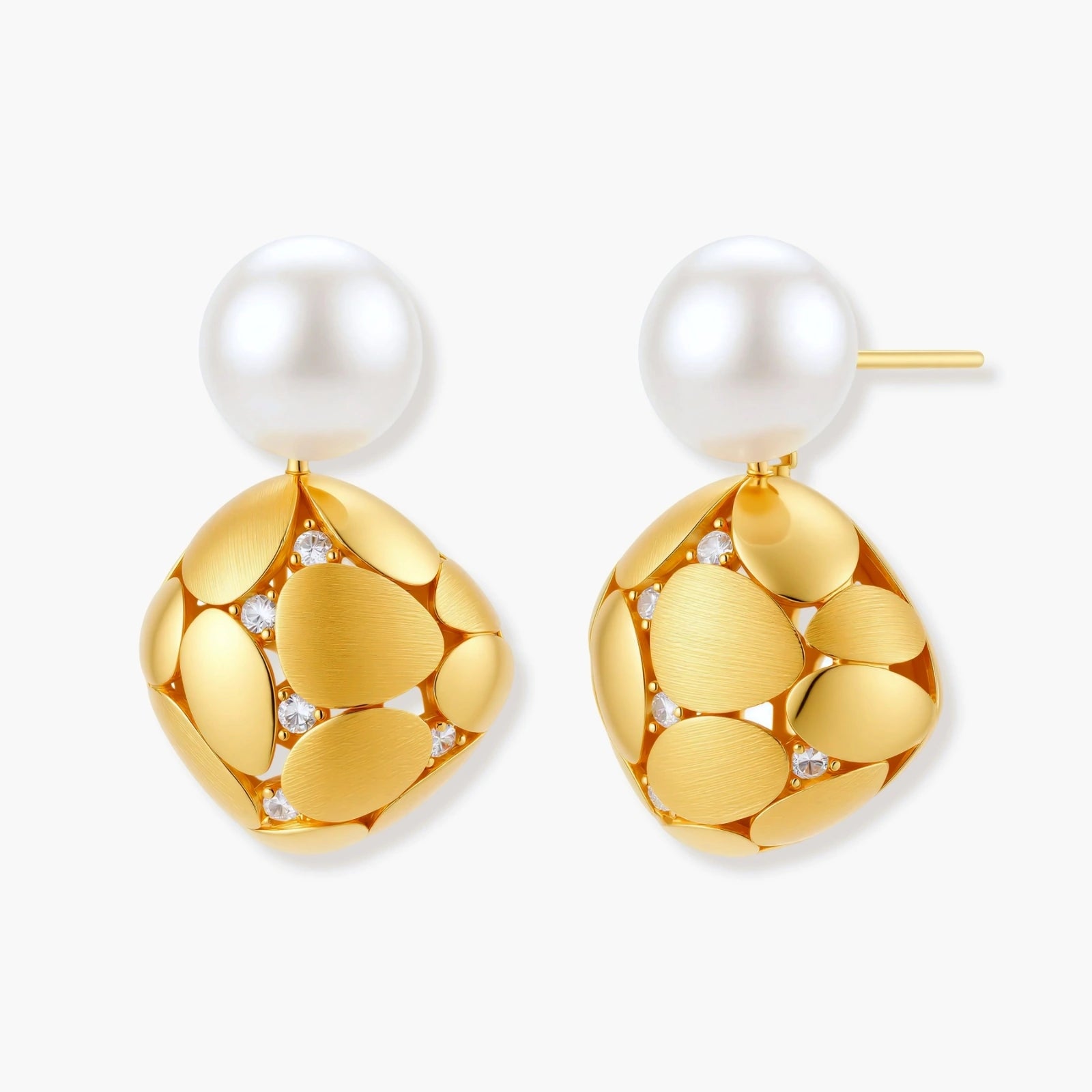 Gold-plated sterling silver drop earrings with white freshwater pearl studs and overlapping petal design with crystal accents