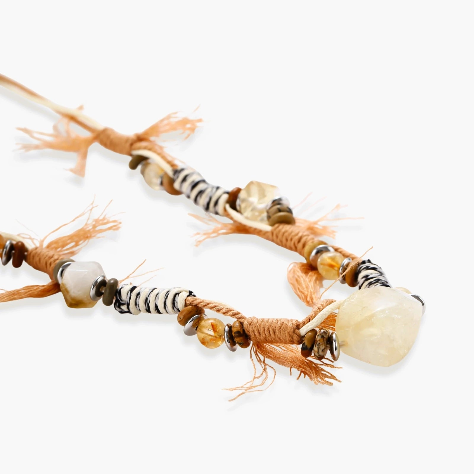 Adjustable brown cord necklace with citrine, coffee calcite beads and striped accents on white background.