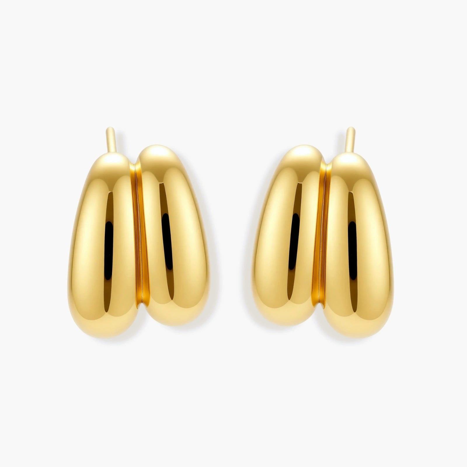 Chunky 18K gold-plated sterling silver hoop earrings with flowing sculptural curves on white background.