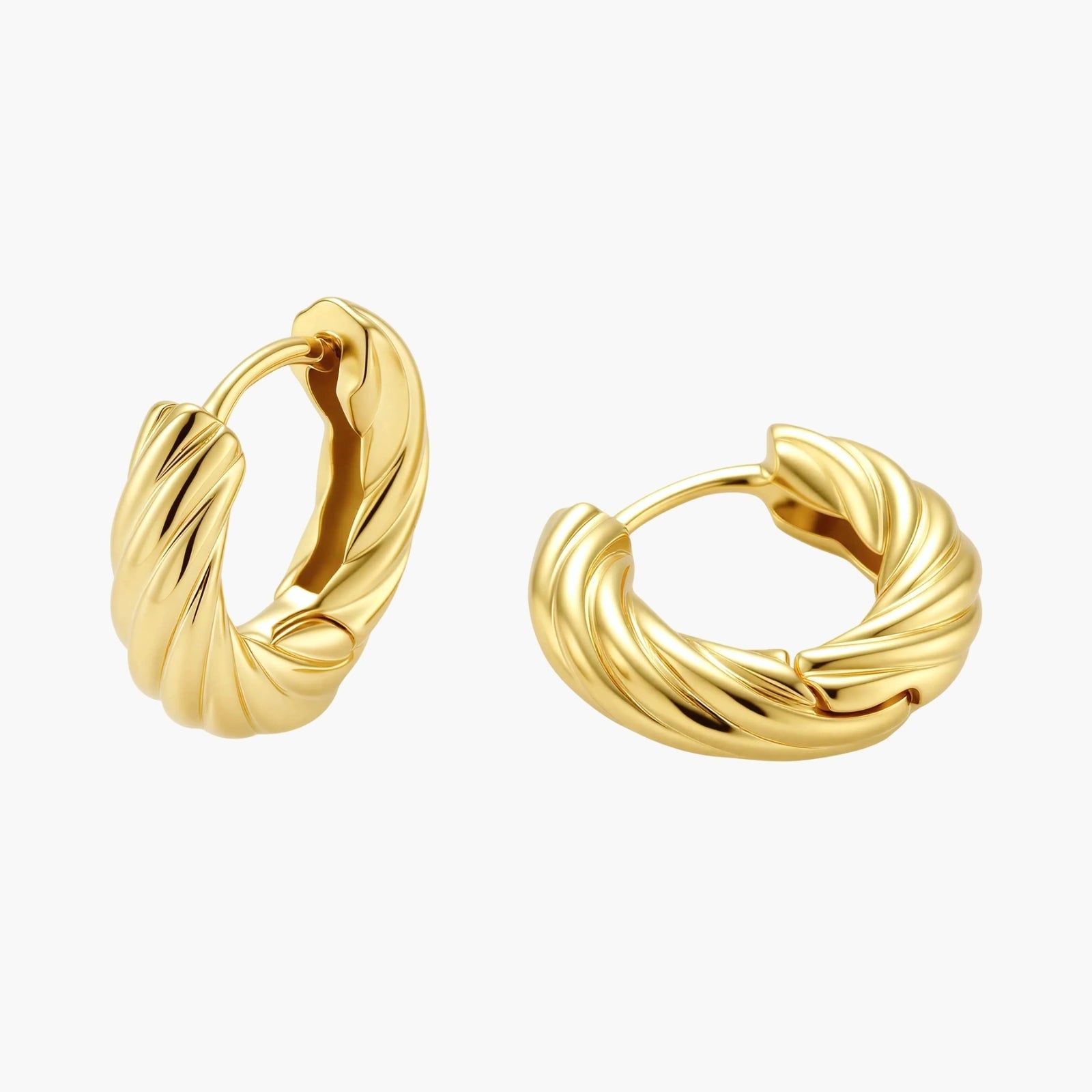14K gold-plated twisted rope huggie hoop earrings with hinged closure on white background, showing textured surface detail