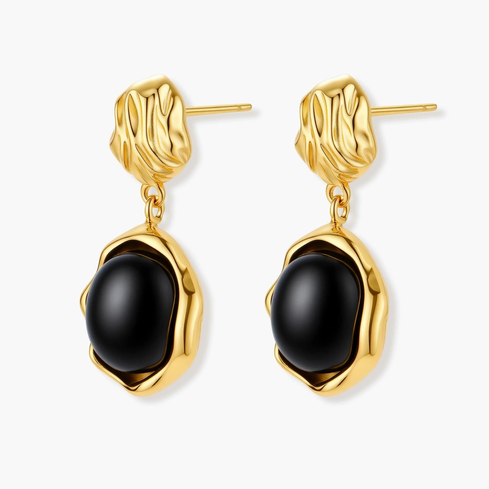 Gold-plated rippled stud earrings with black agate stone drops on white background