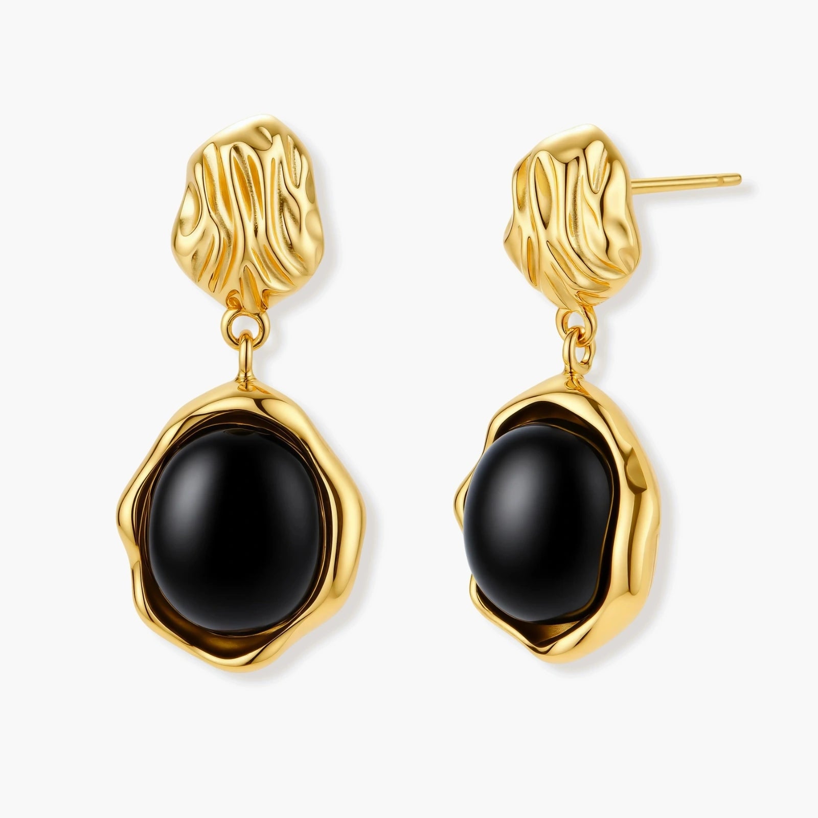 Gold-plated rippled stud earrings with black agate stone drops on white background