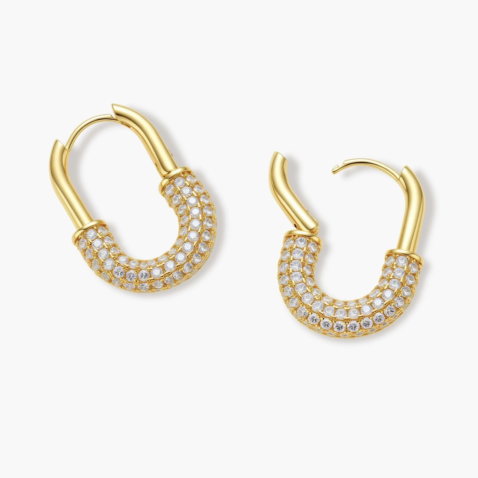 Gold-plated huggie hoop earrings with pavé zirconia stones covering the bottom curve, shown in open and closed positions.
